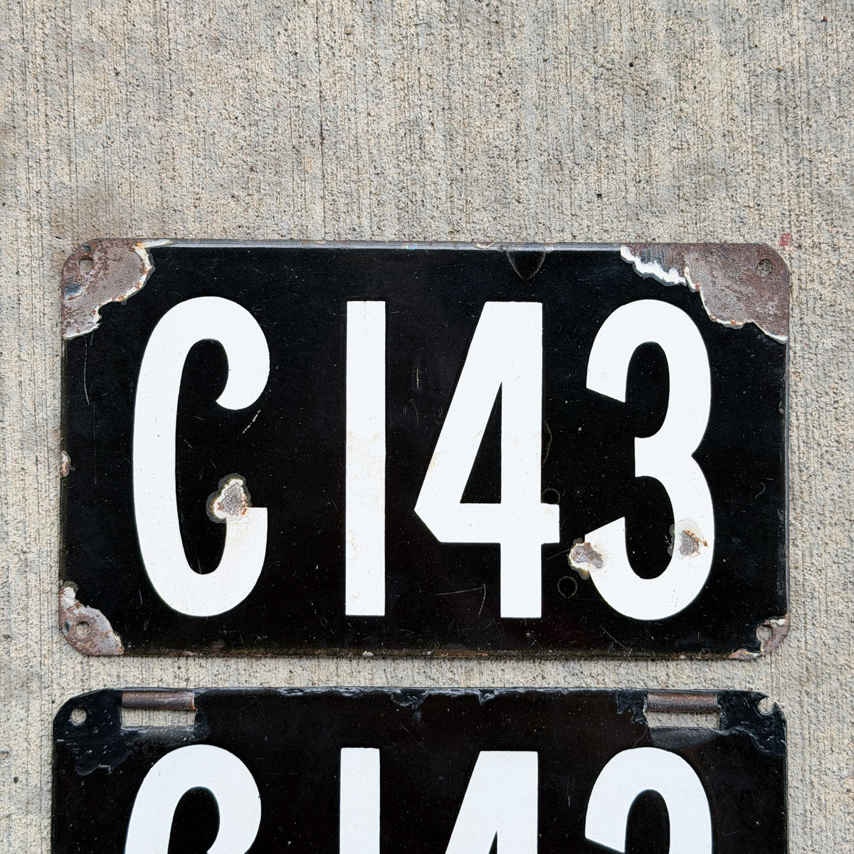 Photo of a 1905 Connecticut Porcelain License Plate Pair Auto Tag Garage Decor Vintage Low Number Three Digit 143 with original patina