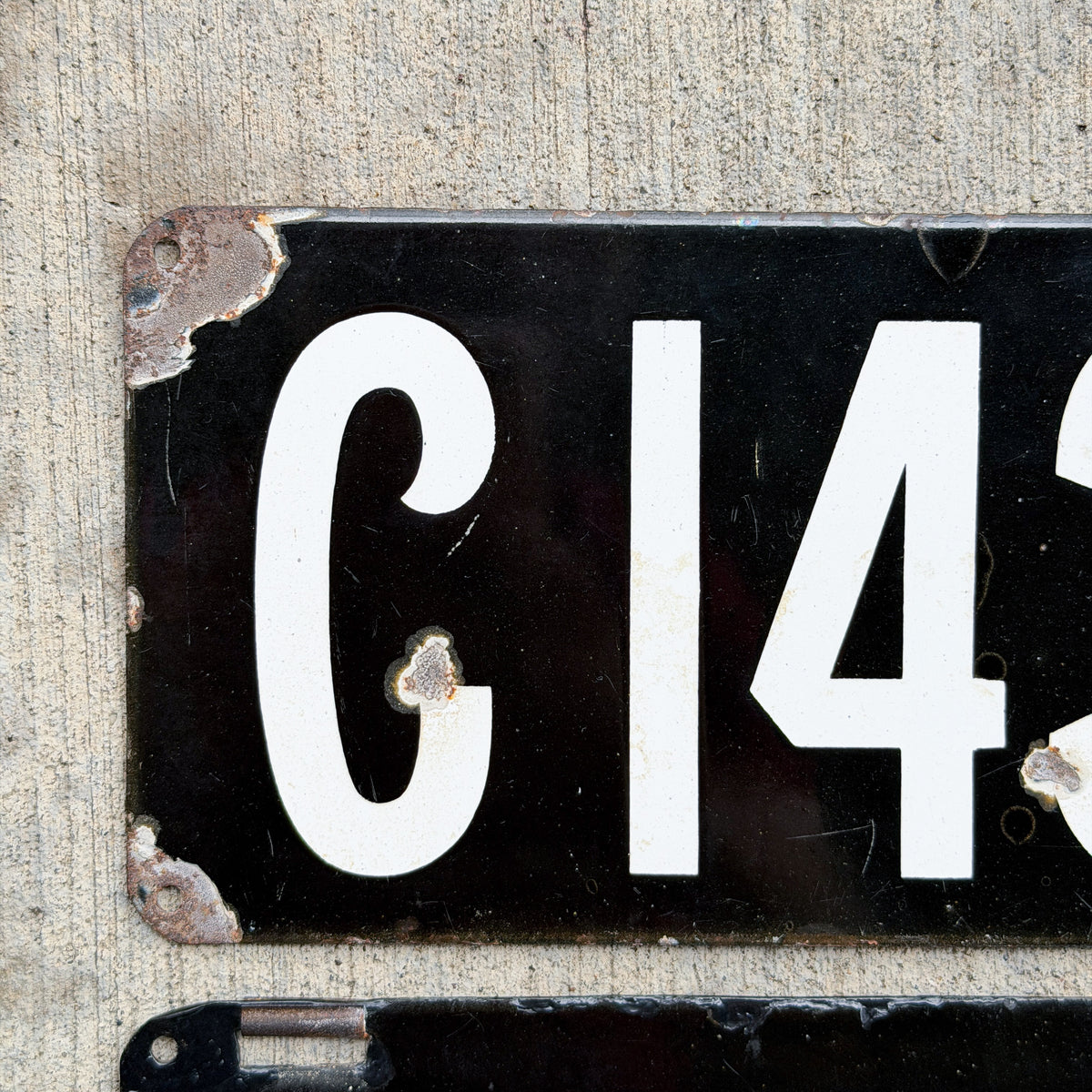 Photo of a 1905 Connecticut Porcelain License Plate Pair Auto Tag Garage Decor Vintage Low Number Three Digit 143 with original patina