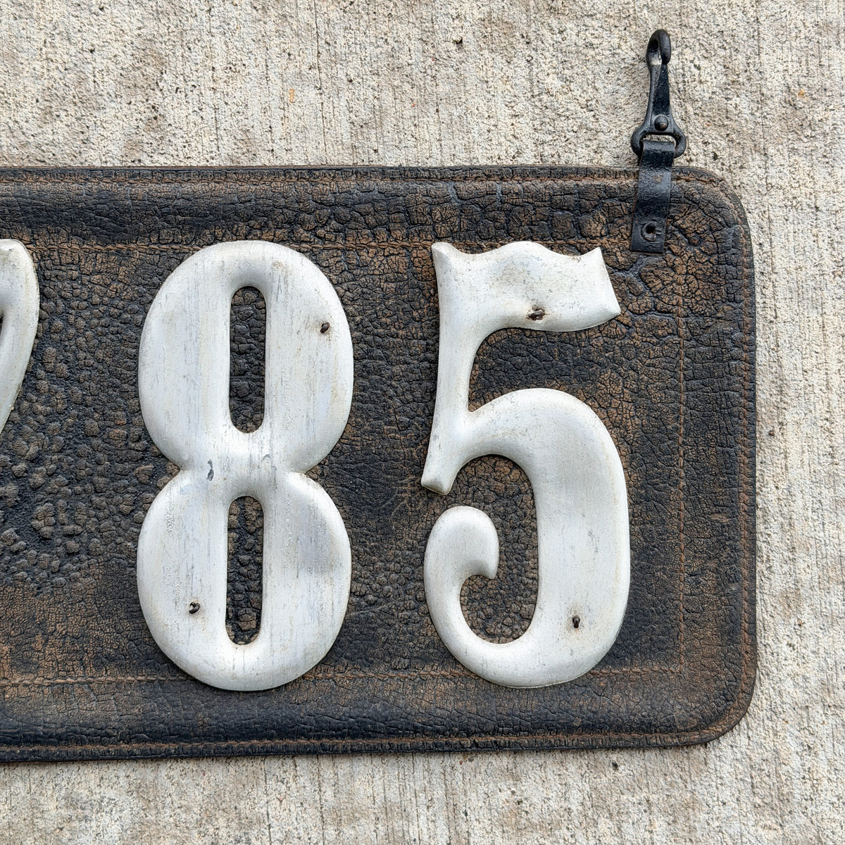 Photo of a 1907 1917 Texas Leather License Plate Auto Tag Garage Decor Vintage Low Number Three Digit 785 with original patina