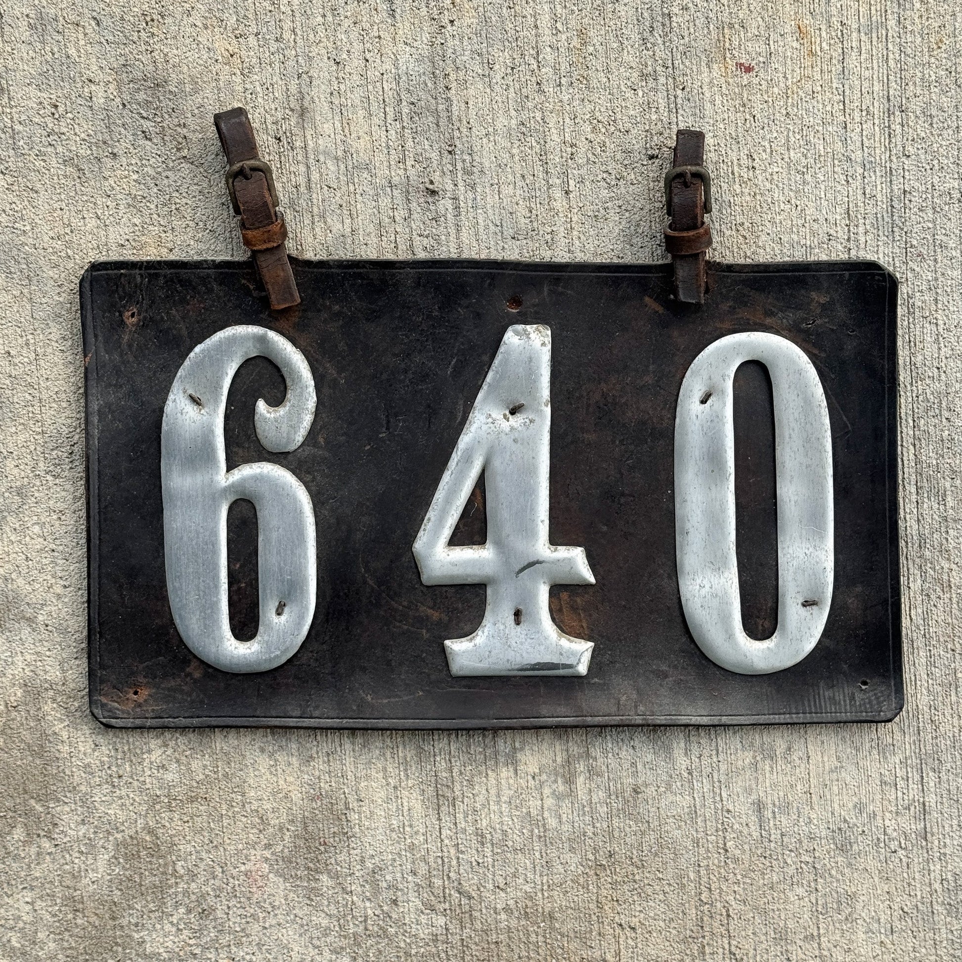 Photo of a 1907 1917 Texas Leather Prestate License Plate Auto Tag Garage Decor Vintage Low Number Three Digit 640 with original patina