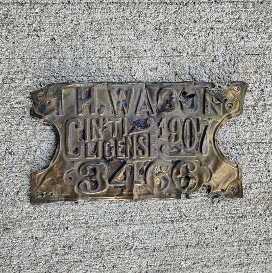 Photo of a 1907 Ohio 1 Horse Wagon License Plate Auto Tag Garage Decor Vintage Brass 3466 with original patina