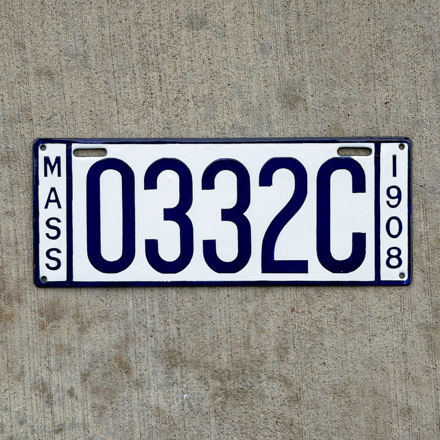 Photo of a 1908 Massachusetts Dealer License Plate Auto Tag Garage Decor Vintage High Quality 0332C with original patina