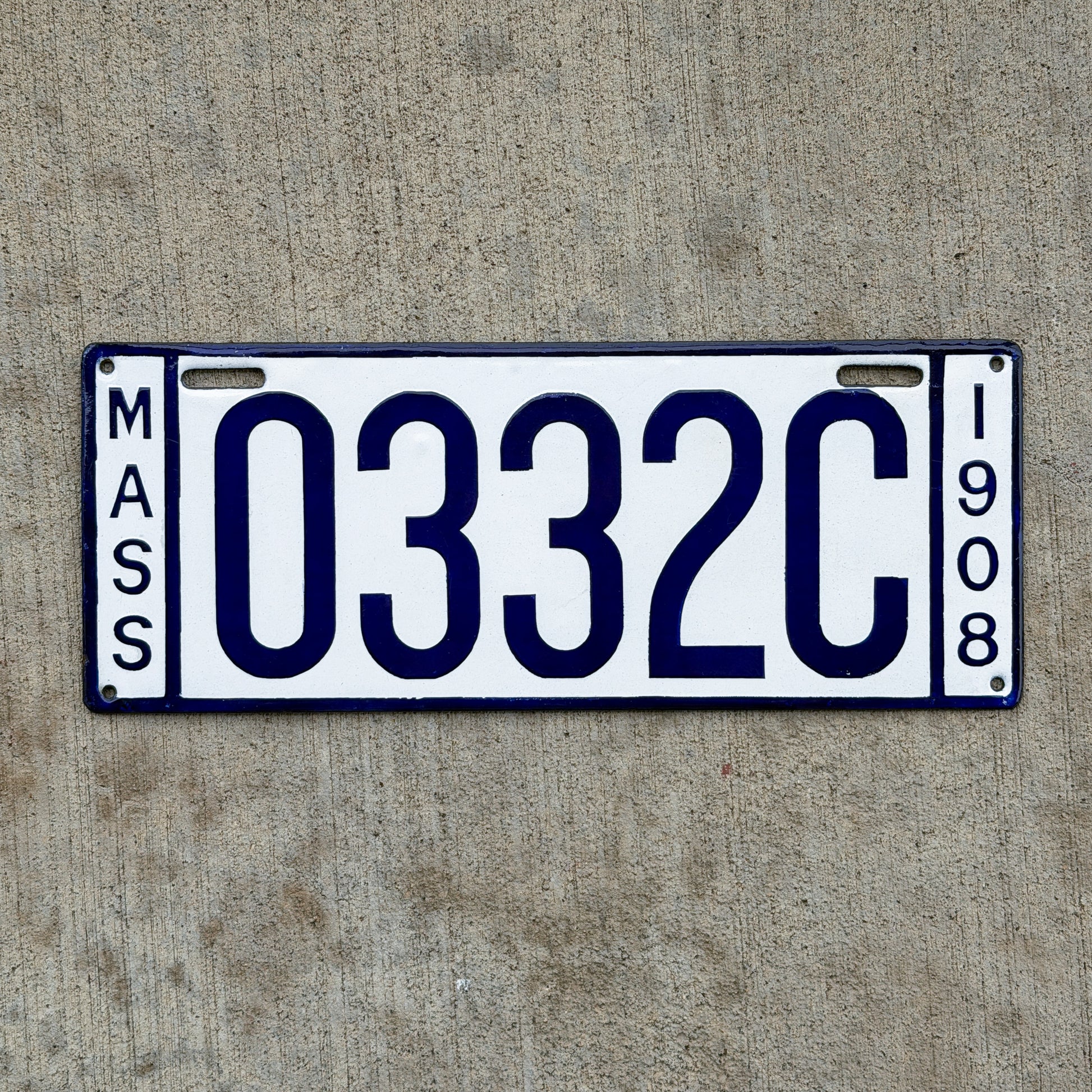 Photo of a 1908 Massachusetts Dealer License Plate Auto Tag Garage Decor Vintage High Quality 0332C with original patina