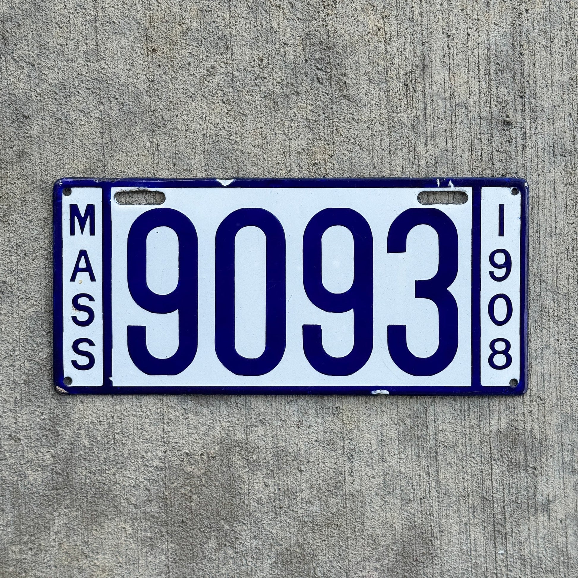 Photo of a 1908 Massachusetts Porcelain License Plate Auto Tag 2 Vintage Garage Low Number Four Digit High Quality 9093 with original patina