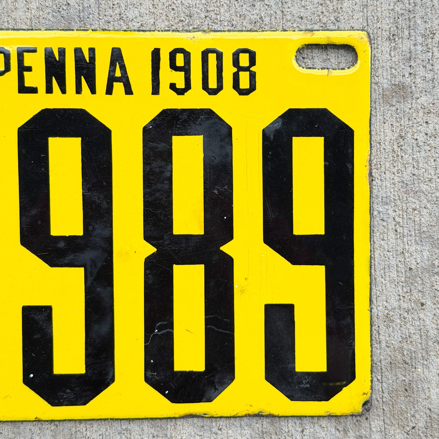 Photo of a 1908 Pennsylvania Porcelain License Plate Auto Tag Garage Decor Vintage High Quality Low Number Four Digit 6989 with original patina