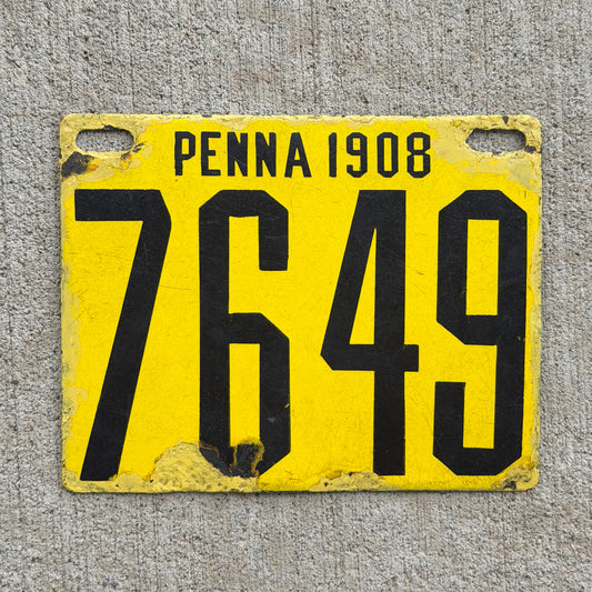 Photo of a 1908 Pennsylvania Porcelain License Plate Auto Tag Garage Decor Vintage Low Number Four Digit 7649 with original patina