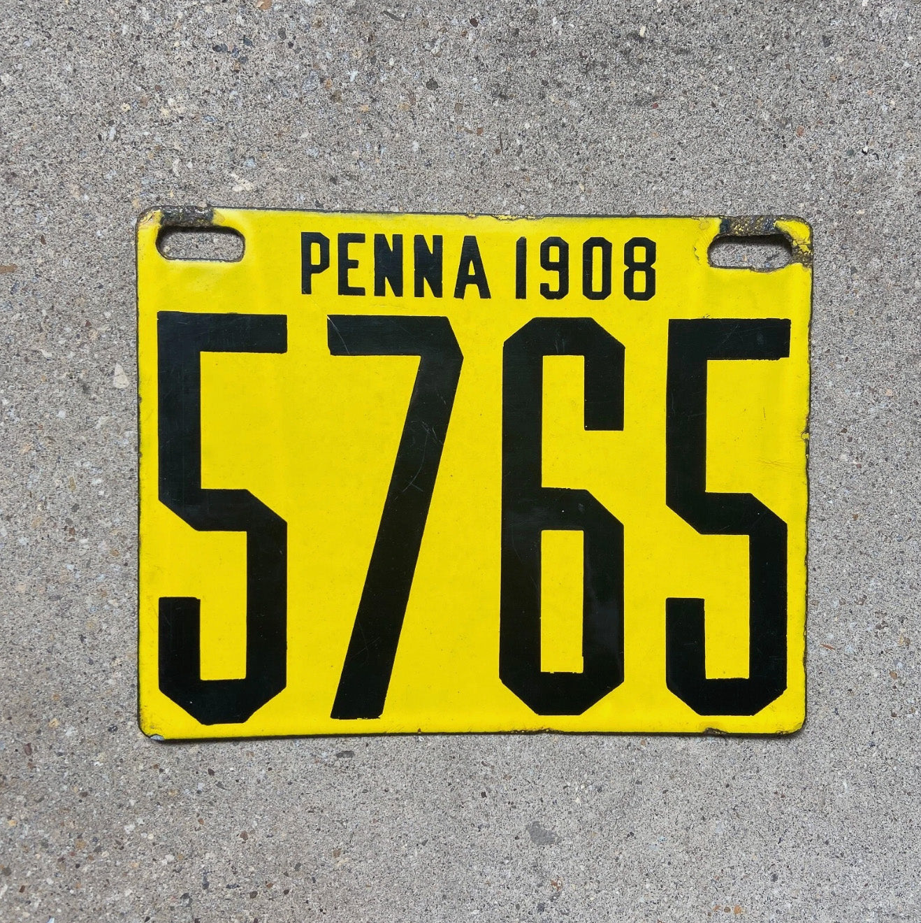 Photo of a 1908 Pennsylvania Porcelain License Plate Auto Tag Garage Decor Vintage Nice Quality Low Number Four Digit 5765 with original patina