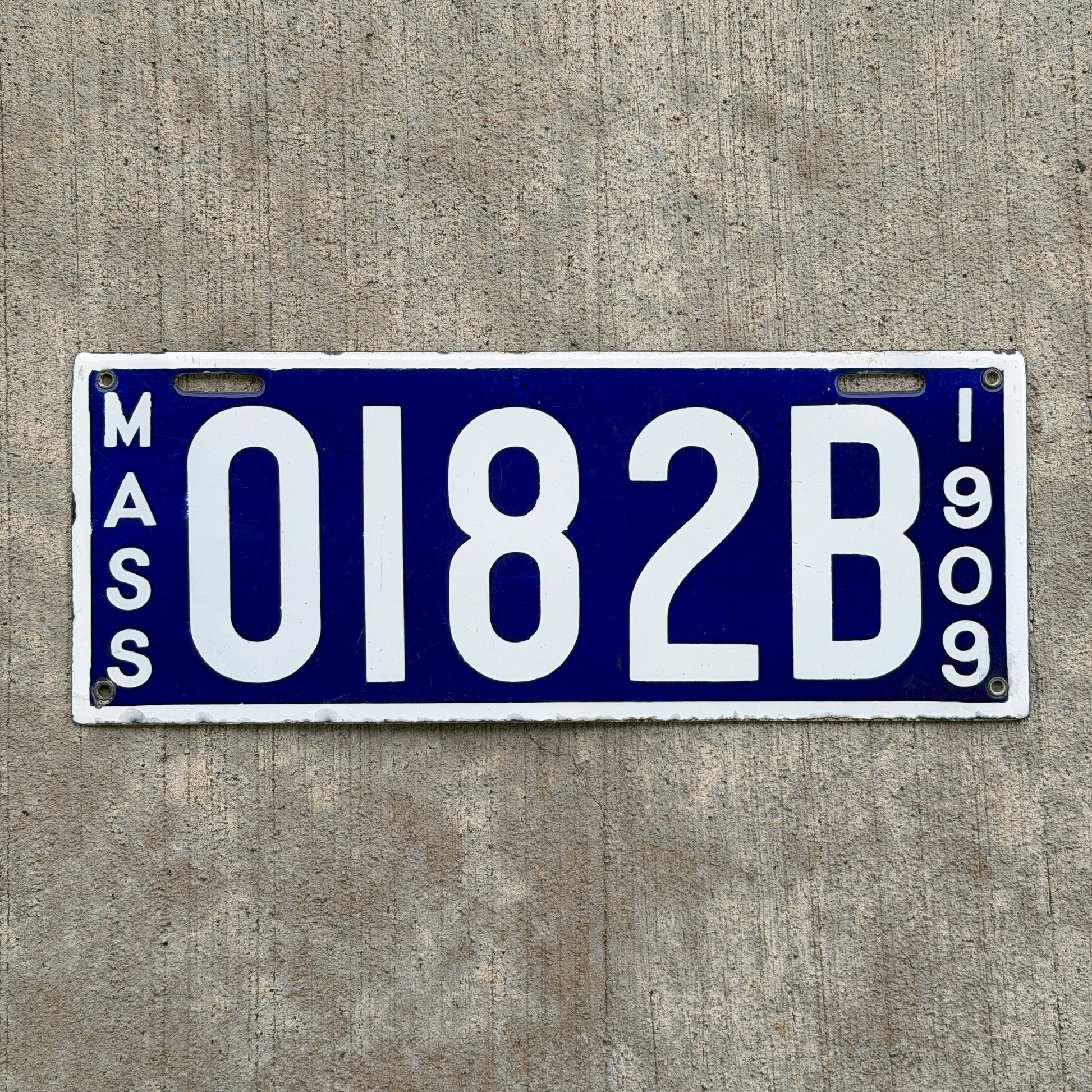 Photo of a 1909 Massachusetts Dealer License Plate Auto Tag Garage Decor Vintage High Quality 0182B with original patina