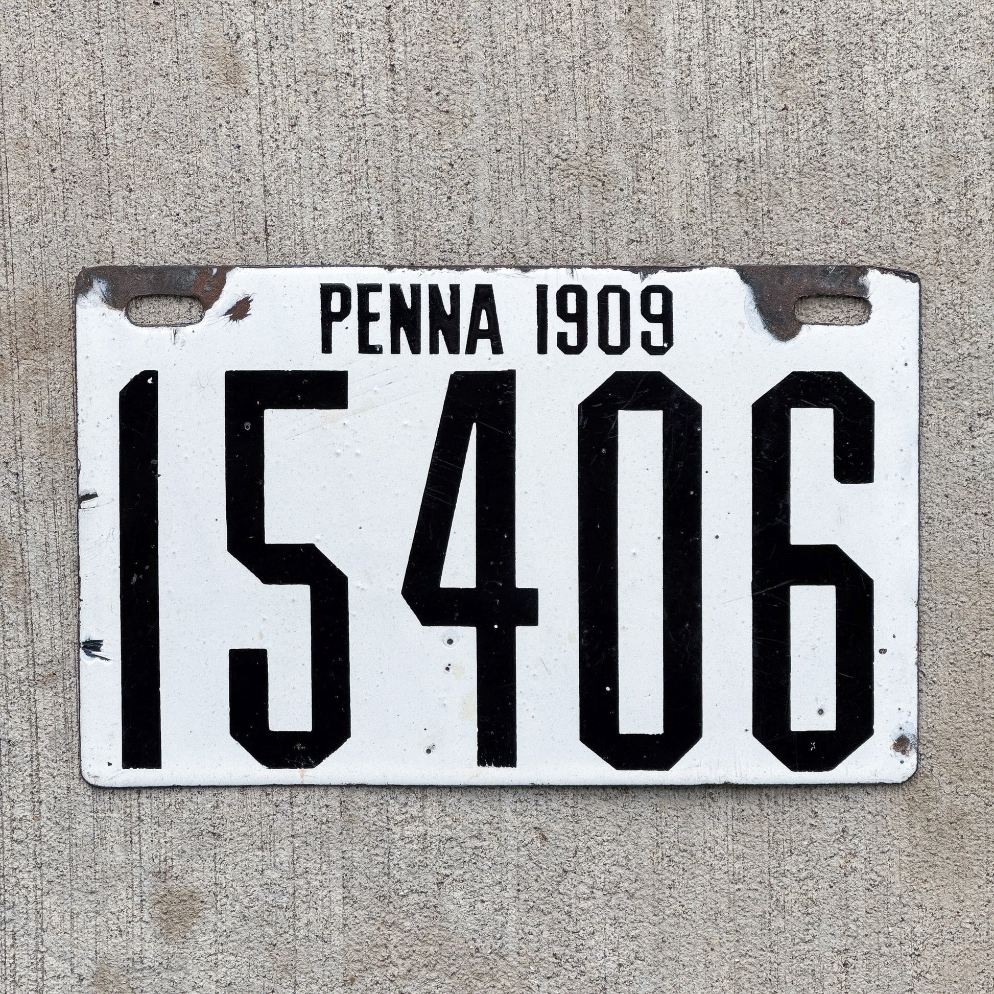 Photo of a 1909 Pennsylvania Porcelain License Plate Auto Tag Garage Decor Vintage 15406 with original patina
