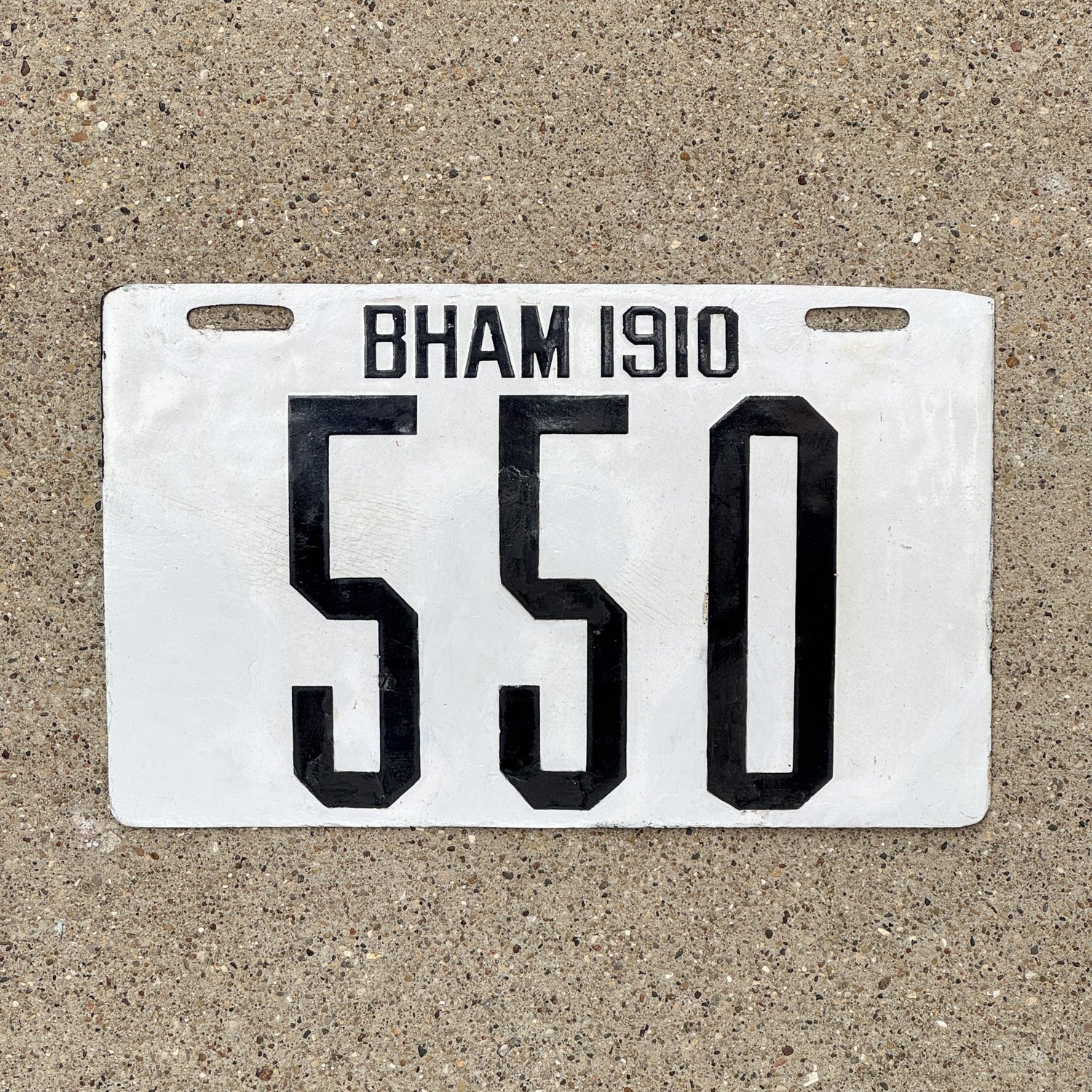 Photo of a 1910 Alabama Porcelain License Plate Auto Tag Garage Decor Vintage Birmingham 550 with original patina