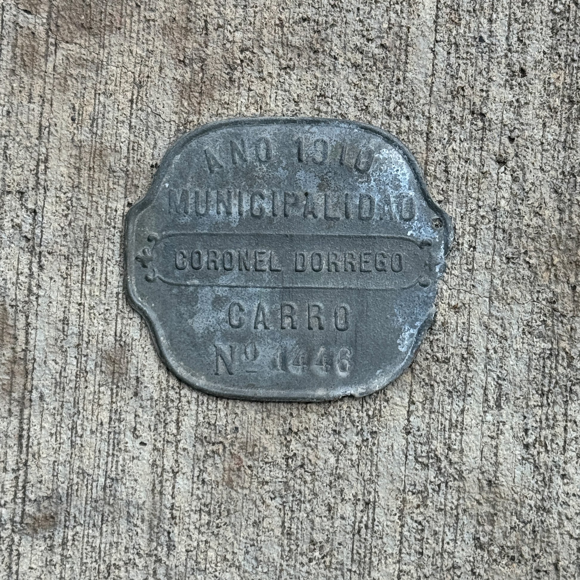 Photo of a 1910 Coronel Dorrego Argentina Auto Tag Garage Decor Vintage Badge 1446 with original patina