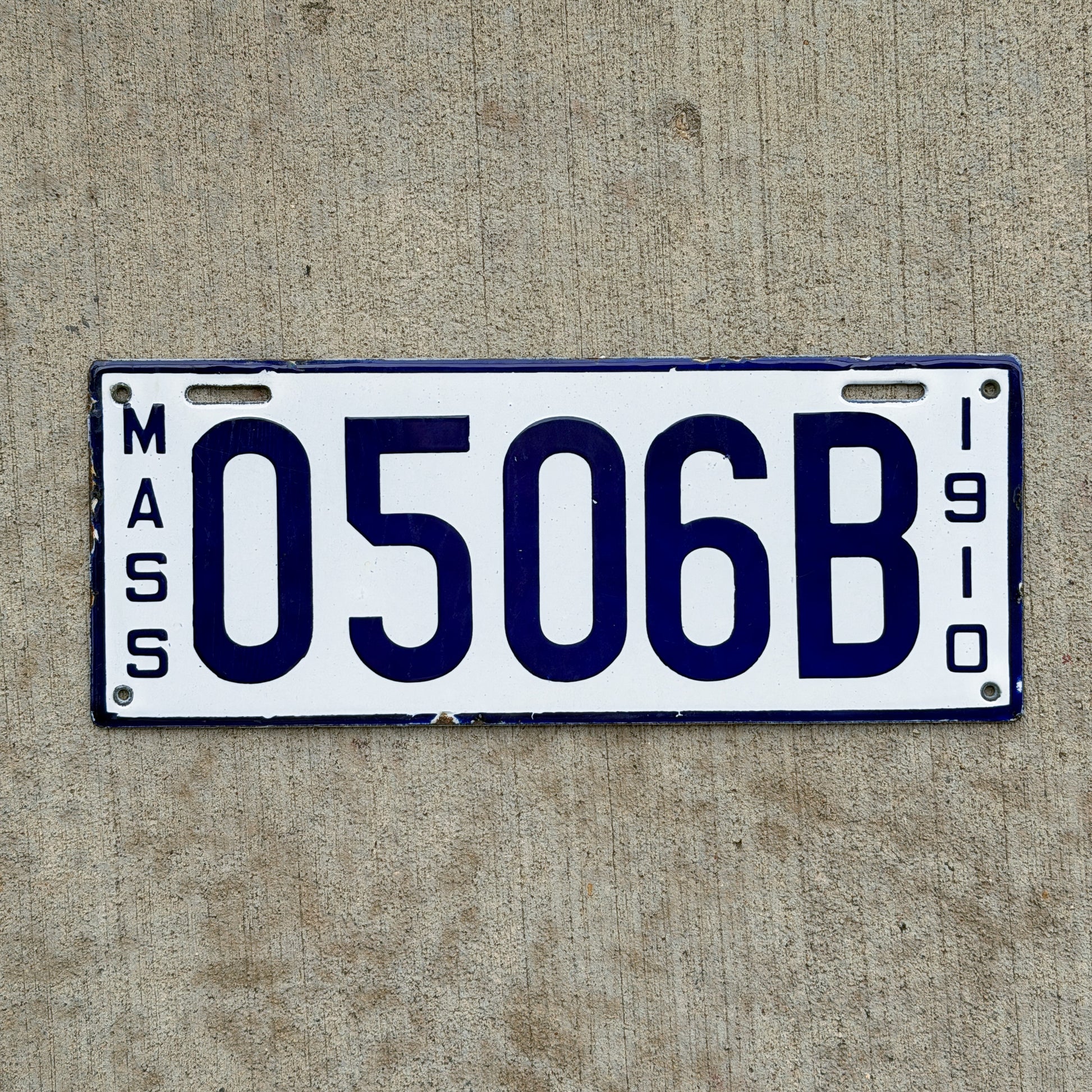 Photo of a 1910 Massachusetts Dealer License Plate Auto Tag Garage Decor Vintage High Quality 0506B with original patina