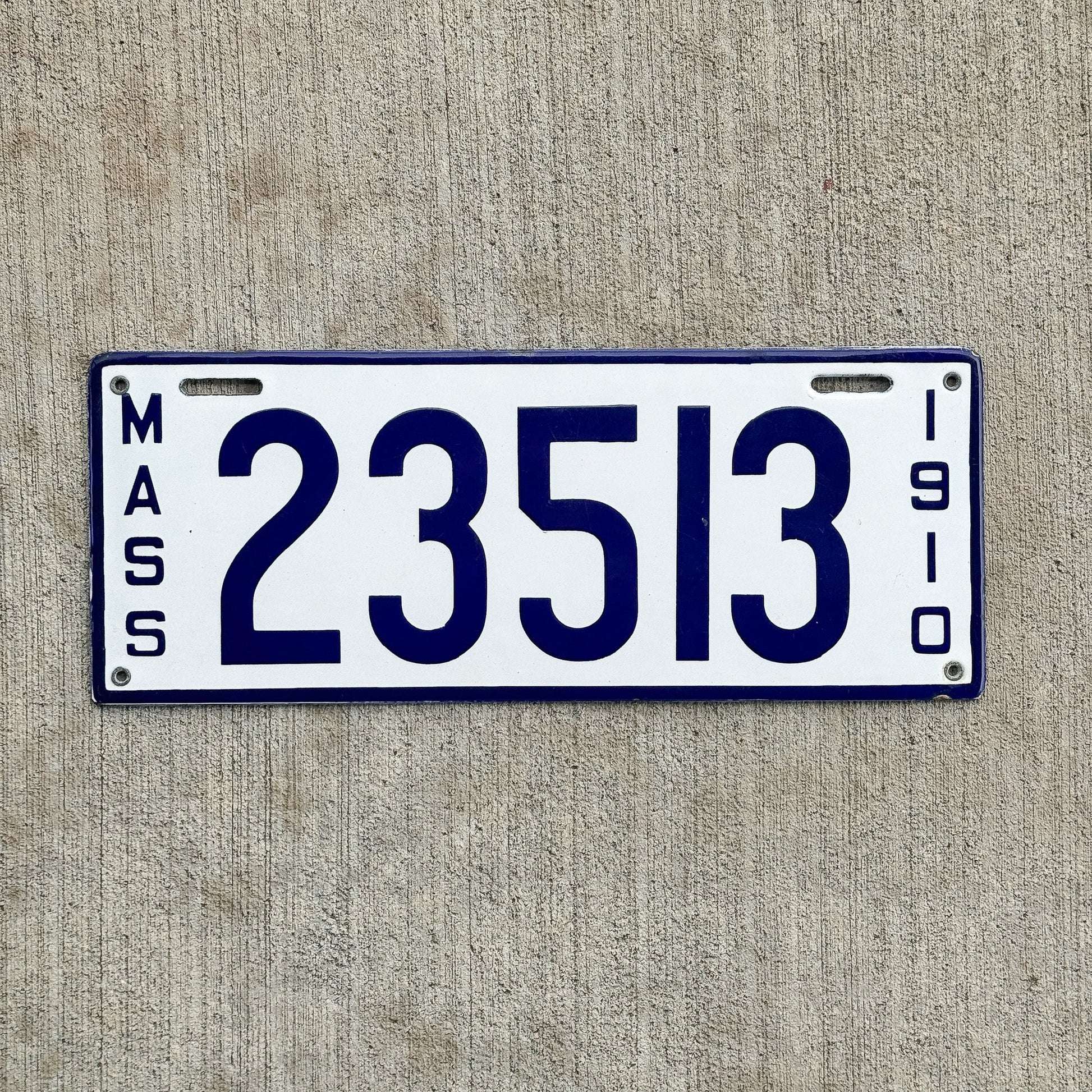 Photo of a 1910 Massachusetts Porcelain License Plate Auto Tag Garage Decor Vintage High Quality 23513 with original patina