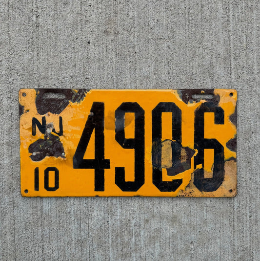 Photo of a 1910 New Jersey Porcelain License Plate Auto Tag Garage Decor Vintage 4 Digit 4906