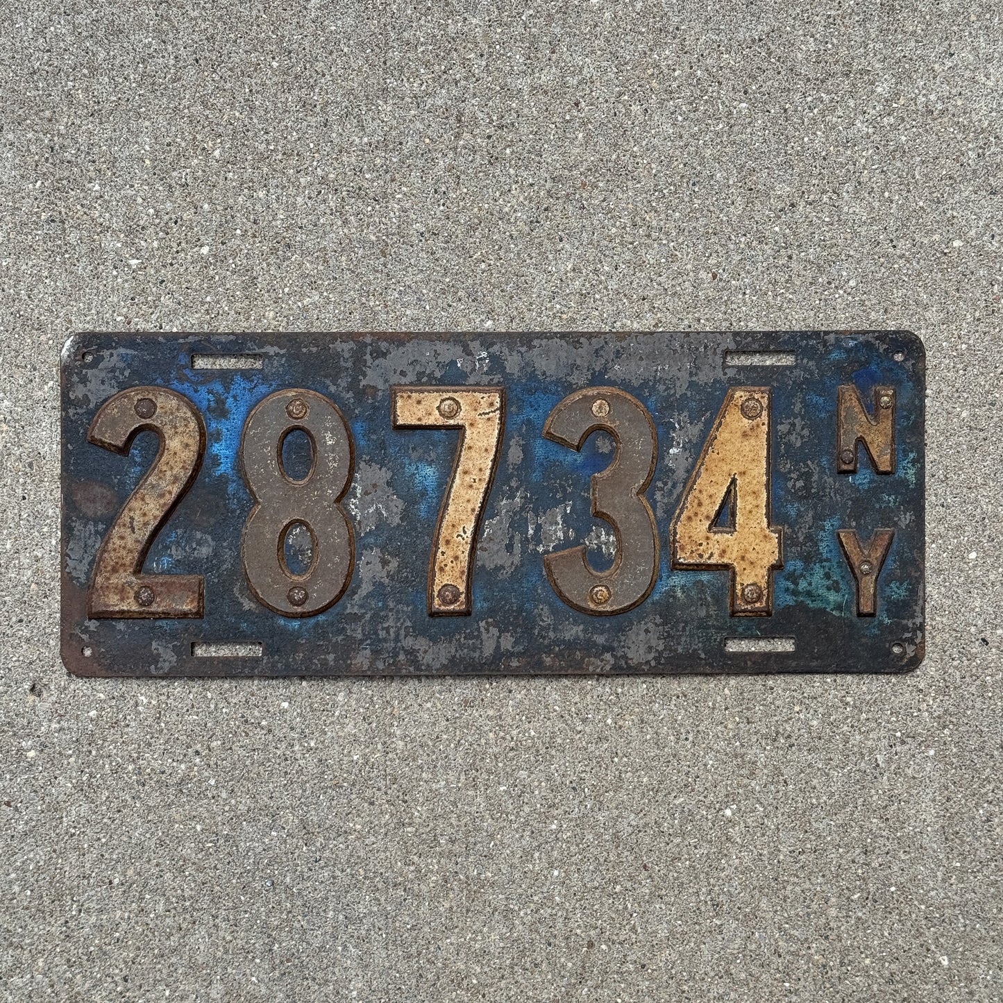 Photo of a 1910 New York License Plate Auto Tag Garage Decor Vintage First Issue 28734 with original patina