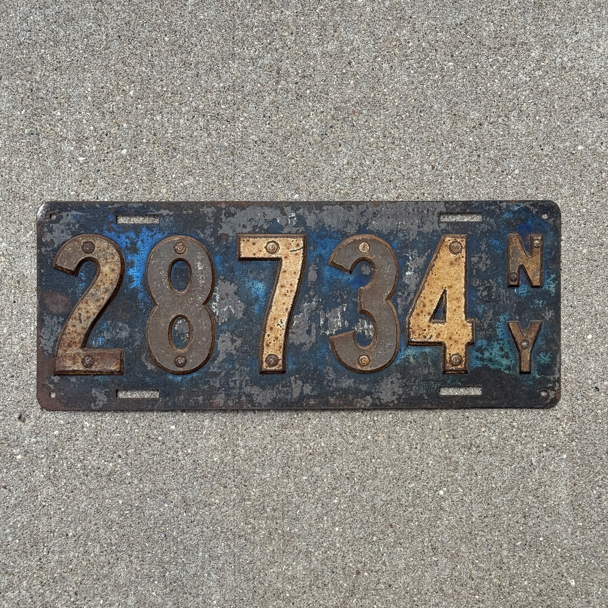 Photo of a 1910 New York License Plate Auto Tag Garage Decor Vintage First Issue 28734 with original patina