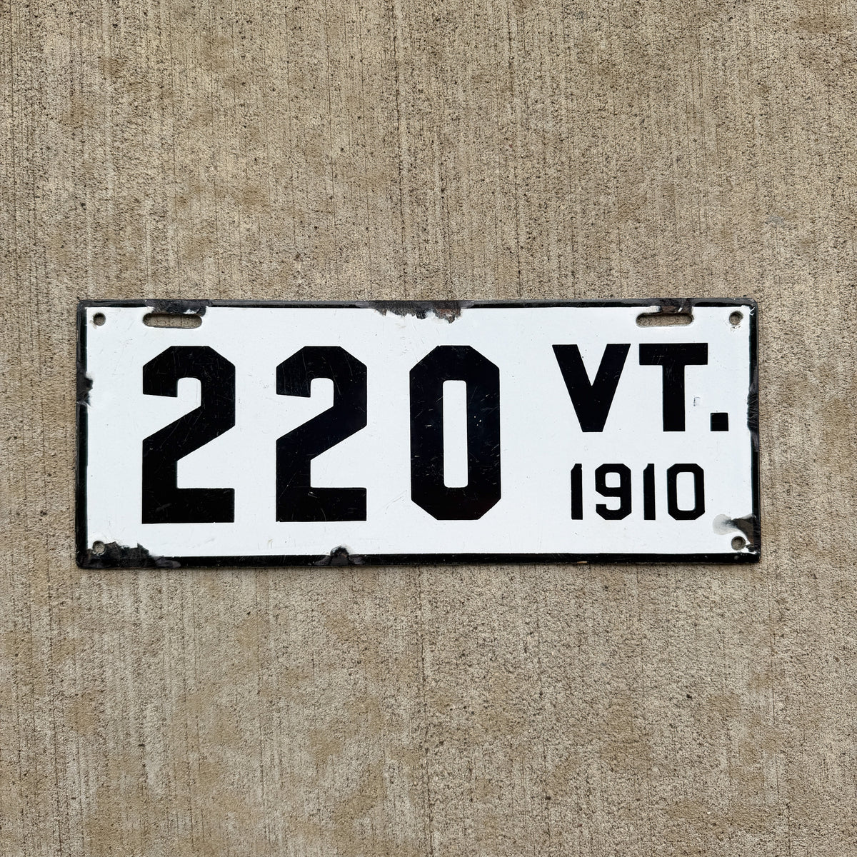 Photo of a 1910 Vermont Porcelain License Plate Auto Tag Garage Decor Vintage Low Number Three Digit 220 with original patina