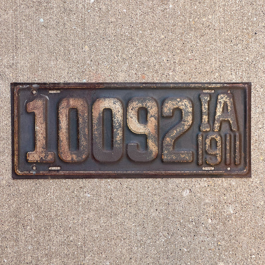 Photo of a 1911 Iowa License Plate Auto Tag 1 Garage Decor First Issue 10092 with original patina