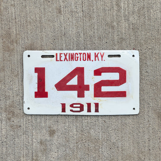 Photo of a 1911 Kentucky Porcelain License Plate Auto Tag Garage Decor Vintage Lexington Hard o Find 142 with original patina