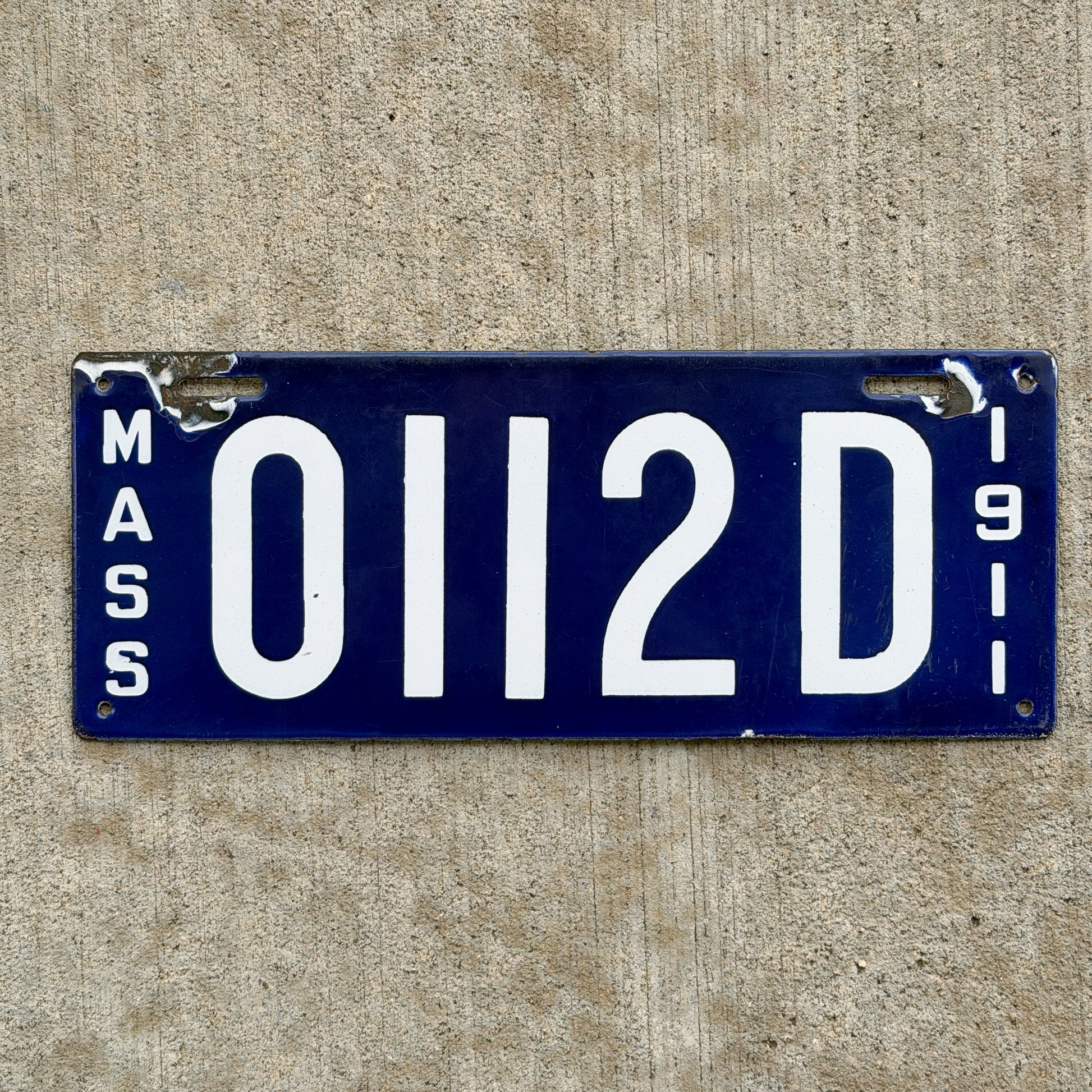 Photo of a 1911 Massachusetts Dealer License Plate Auto Tag Garage Decor Vintage High Quality 0112D with original patina