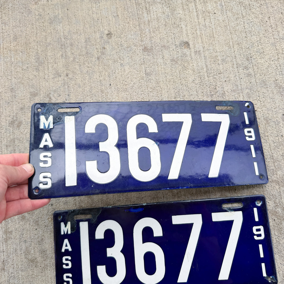 Photo of a 1911 Massachusetts Porcelain License Plate Pair Auto Tag Garage Decor Vintage With Replacement Plate 13677 with original patina