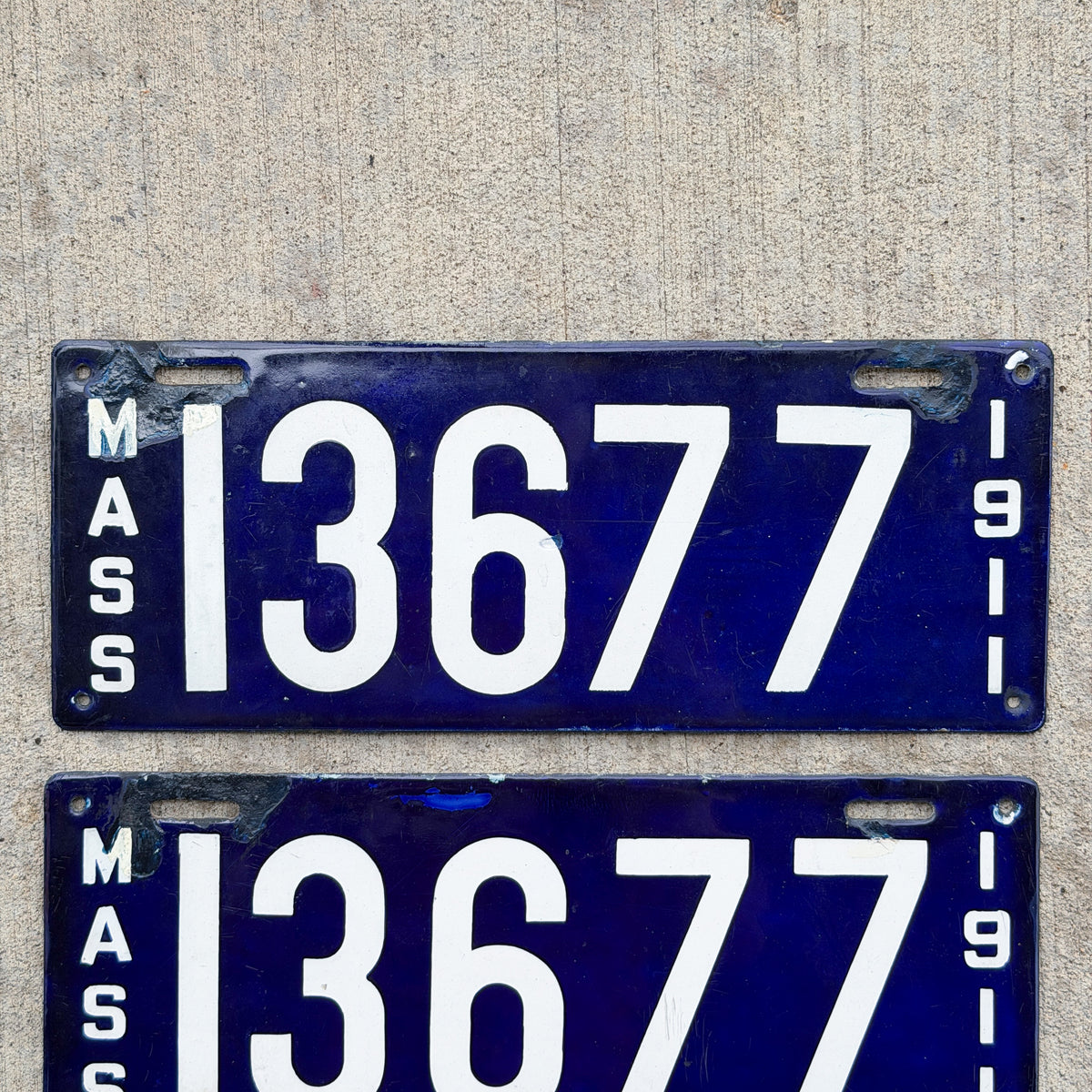 Photo of a 1911 Massachusetts Porcelain License Plate Pair Auto Tag Garage Decor Vintage With Replacement Plate 13677 with original patina