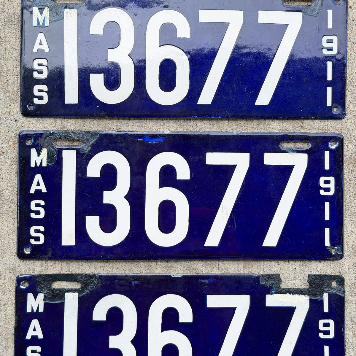Photo of a 1911 Massachusetts Porcelain License Plate Pair Auto Tag Garage Decor Vintage With Replacement Plate 13677 with original patina