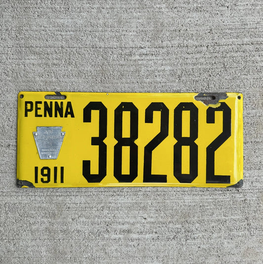 Photo of a 1911 Pennsylvania Porcelain Dealer License Plate Auto Tag Garage Decor Vintage Dishpan Type Beveled 38282 with original patina