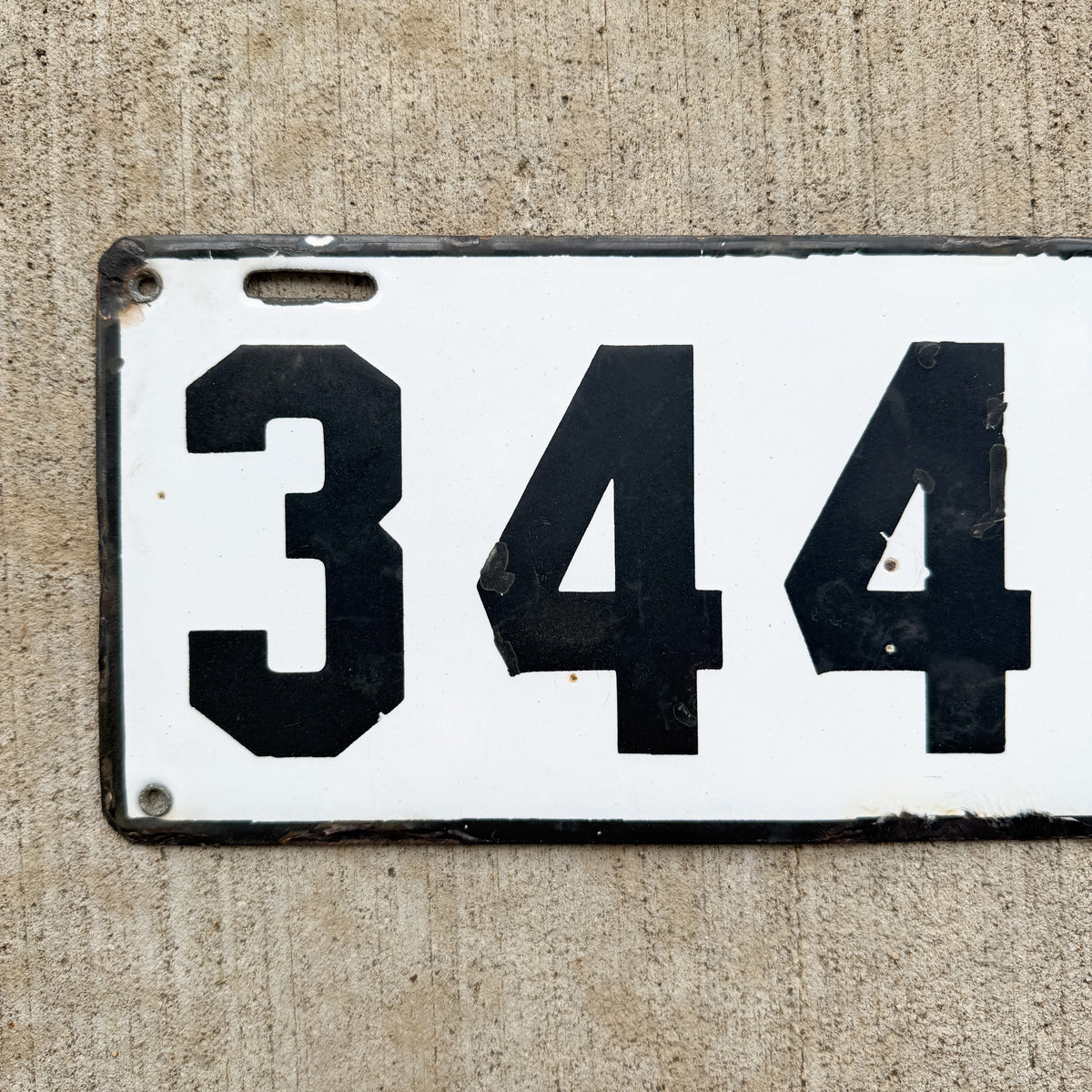 Photo of a 1911 Vermont Porcelain License Plate Auto Tag Garage Decor Vintage Low Number Three Digit 344 with original patina