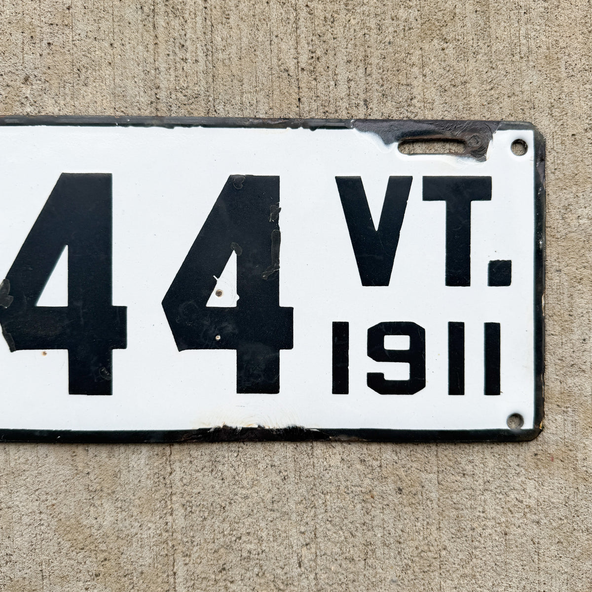 Photo of a 1911 Vermont Porcelain License Plate Auto Tag Garage Decor Vintage Low Number Three Digit 344 with original patina