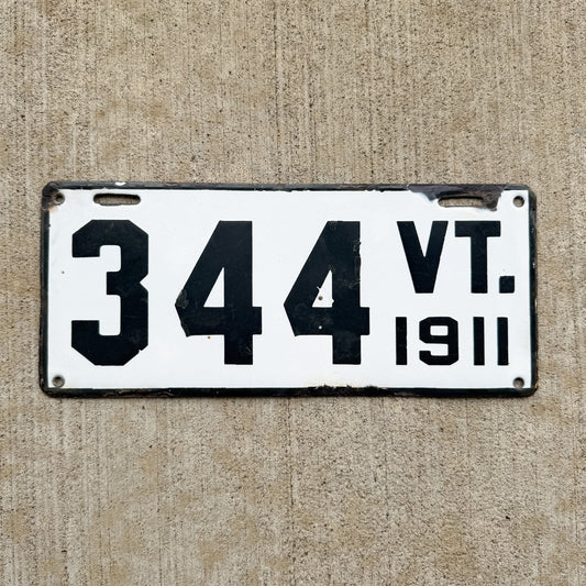 Photo of a 1911 Vermont Porcelain License Plate Auto Tag Garage Decor Vintage Low Number Three Digit 344 with original patina