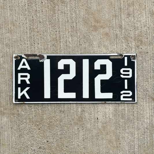 Photo of a 1912 Arkansas Porcelain License Plate Auto Tag Garage Decor Vintage Great Number High Quality 1212 with original patina