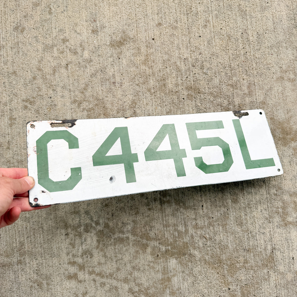 Photo of a 1912 Connecticut Porcelain Livery License Plate Auto Tag Garage Decor Vintage 445 L with original patina