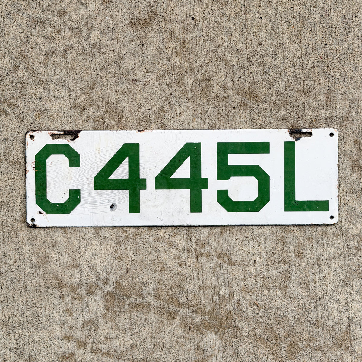 Photo of a 1912 Connecticut Porcelain Livery License Plate Auto Tag Garage Decor Vintage 445 L with original patina