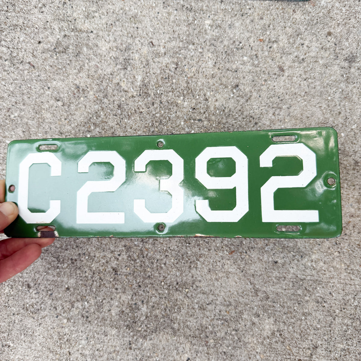 Photo of a 1912 Connecticut Porcelain Motorcycle License Plate Auto Tag Garage Decor Vintage High Quality Four Digit First Issue C 2392 with original patina