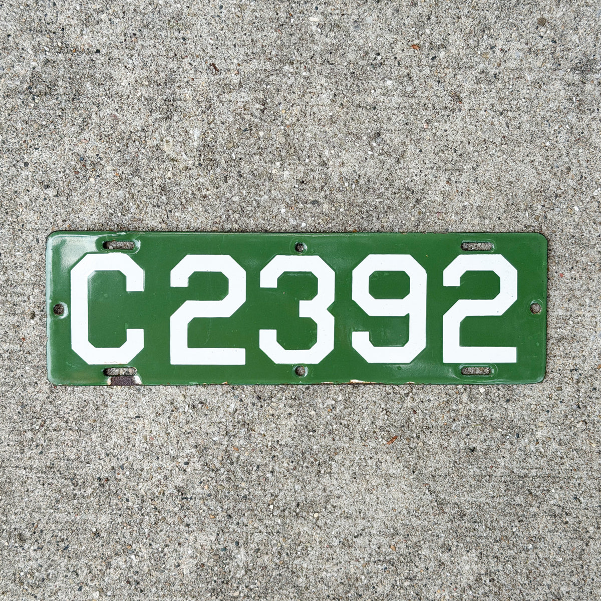 Photo of a 1912 Connecticut Porcelain Motorcycle License Plate Auto Tag Garage Decor Vintage High Quality Four Digit First Issue C 2392 with original patina