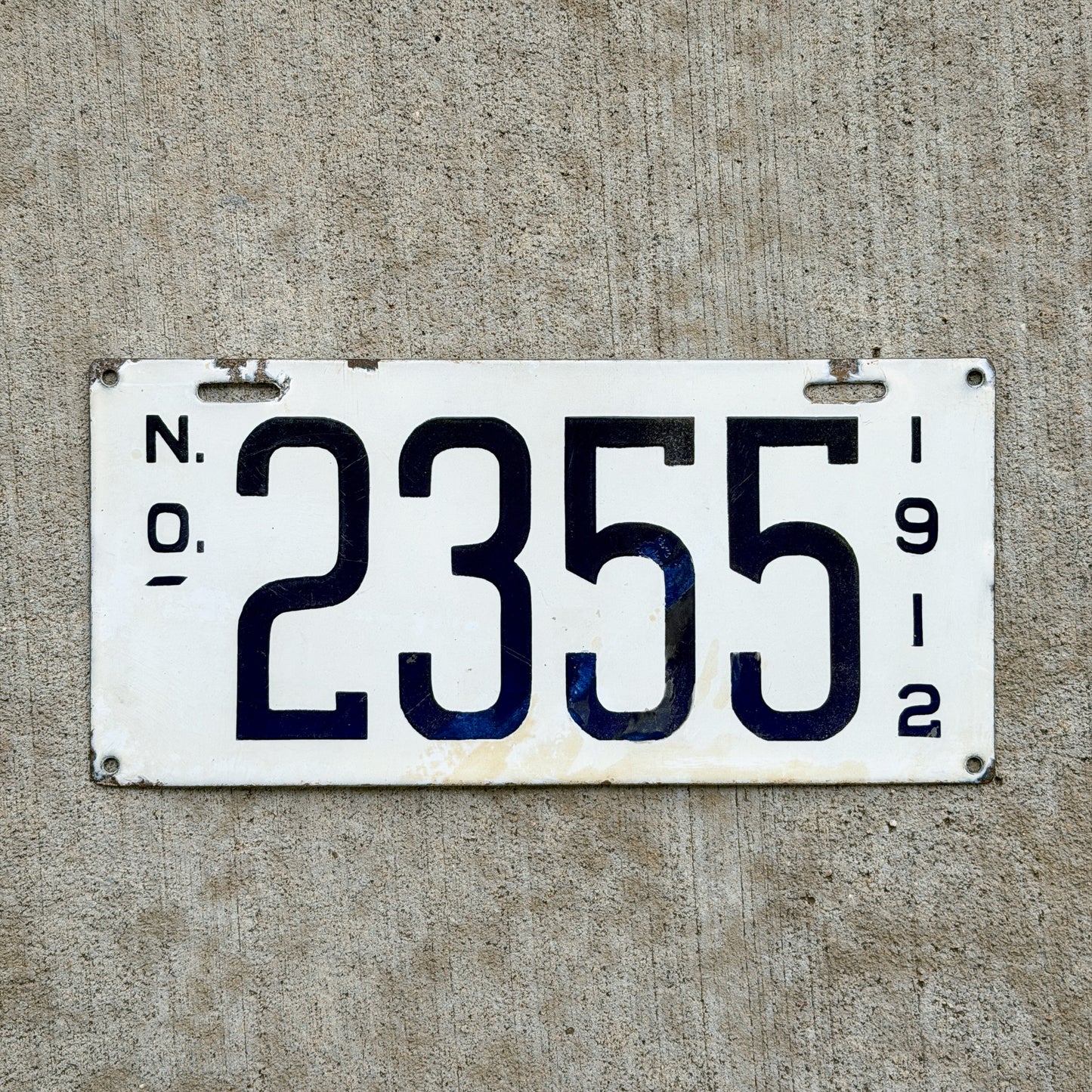 Photo of a 1912 Louisiana Porcelain License Plate Auto Tag Garage Decor Vintage High Quality 2355 with original patina