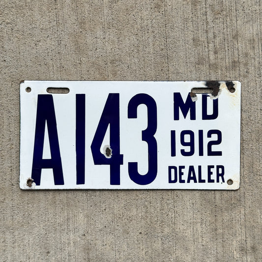Photo of a 1912 Maryland Porcelain Dealer License Plate Auto Tag Garage Decor Vintage High Quality Type 2 A 143 with original patina