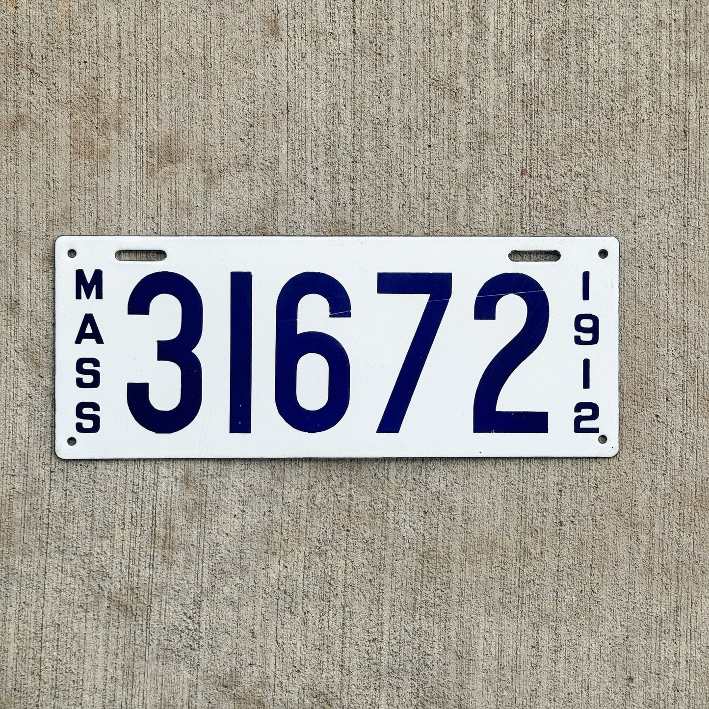 Photo of a 1912 Massachusetts Porcelain License Plate Auto Tag Garage Decor Vintage High Quality 31672 with original patina