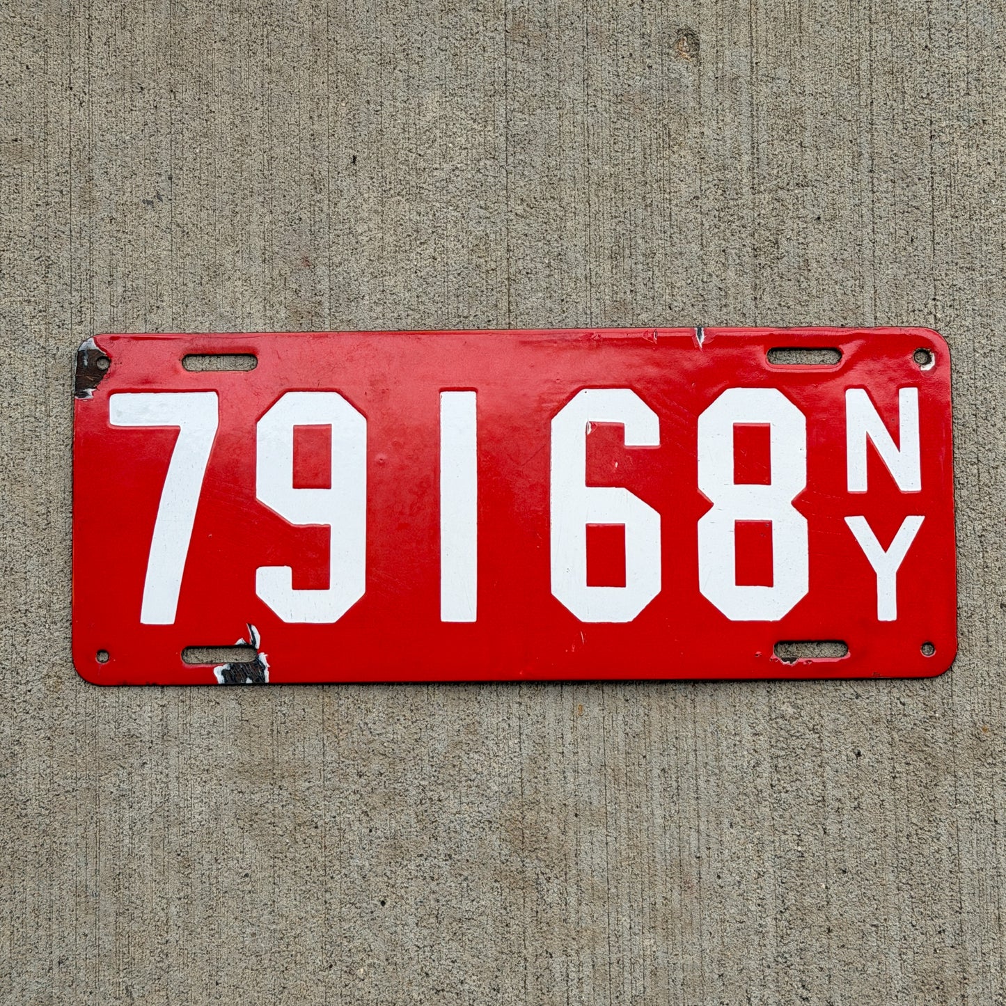 Photo of a 1912 New York Porcelain License Plate Auto Tag Garage Decor Vintage 79168 with original patina