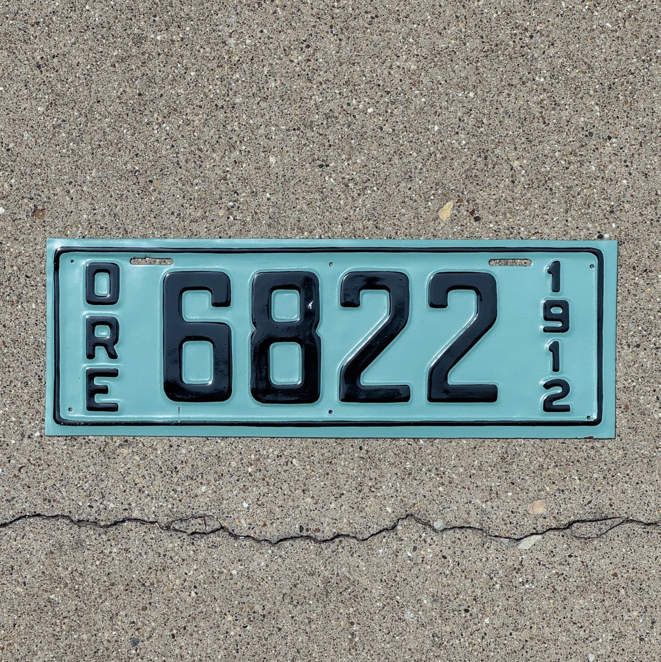 Photo of a 1912 Oregon License Plate Auto Tag Garage Decor Vintage Low Number Four Digit 6822 with original patina