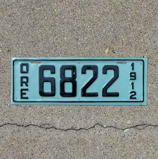 Photo of a 1912 Oregon License Plate Auto Tag Garage Decor Vintage Low Number Four Digit 6822 with original patina