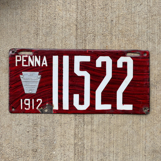 Photo of a 1912 Pennsylvania Porcelain License Plate Auto Tag Garage Decor Vintage Wood Grain 11522 with original patina