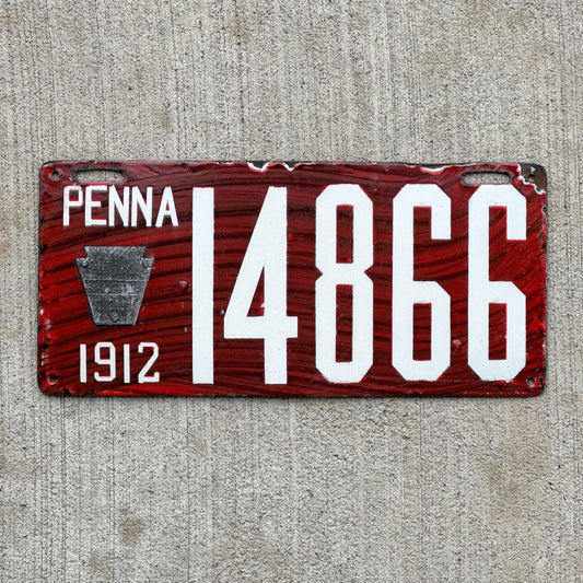 Photo of a 1912 Pennsylvania Porcelain License Plate Auto Tag Garage Decor Vintage Wood Grain 14866 with original patina