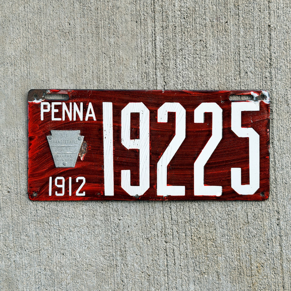 Photo of a 1912 Pennsylvania Porcelain License Plate Auto Tag Garage Decor Vintage Wood Grain 19225 with original patina