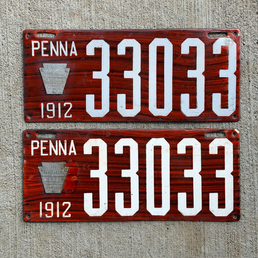 Photo of a 1912 Pennsylvania Porcelain License Plate Pair Auto Tag Garage Decor Vintage Wood Grain 33033 with original patina