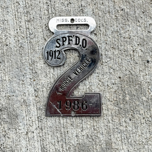 Photo of a 1912 Springfield Ohio 1 Horse Vehicle Auto Tag Garage Decor Vintage 1986 with original patina