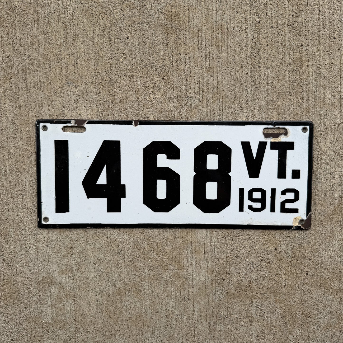 Photo of a 1912 Vermont Porcelain License Plate Auto Tag Garage Decor Vintage Low Number Four Digit 1468 with original patina