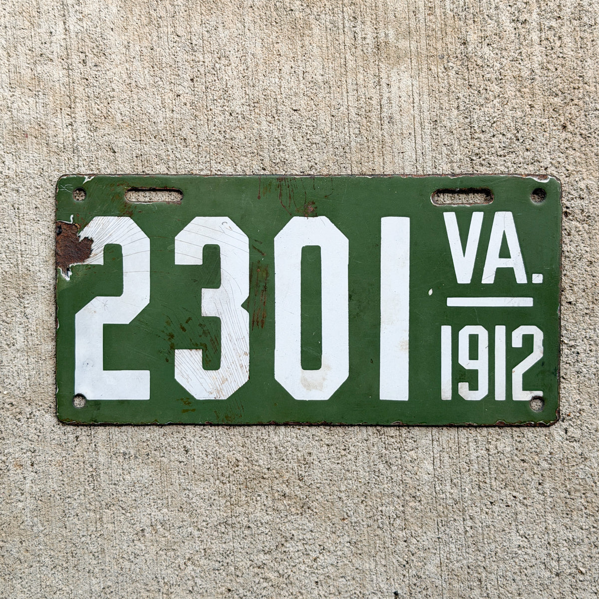 Photo of a 1912 Virginia Porcelain License Plate Auto Tag Garage Decor Vintage Low Number Four Digit 2301 with original patina