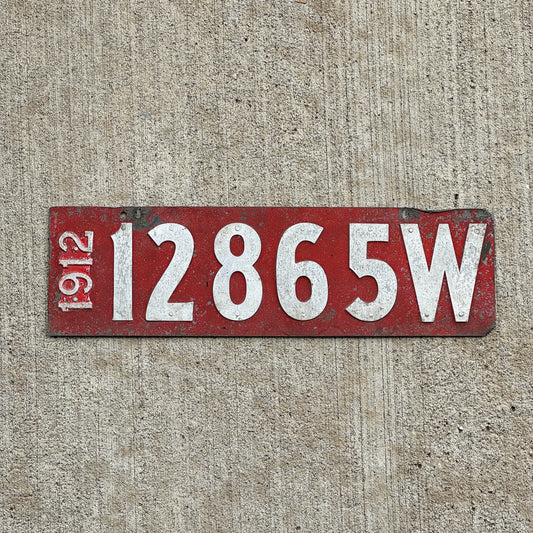 Photo of a 1912 Wisconsin License Plate Auto Tag Garage Decor Vintage 12865 W with original patina